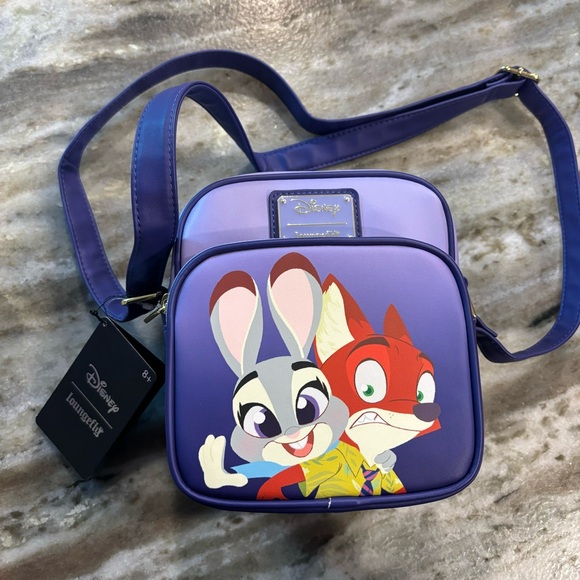 Loungefly Handbags - NWT! Disney Loungefly Zootopia Judy Hopps and Finnick Fox crossbody bag